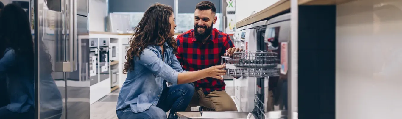 young-couple-appliance-shopping-dishwasher-hero